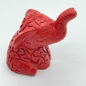 1 Small Orntely hand Carved red Elephant figurine